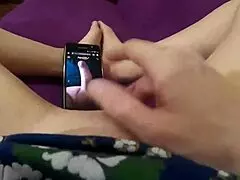 this redhead milf is masturbating her pussy in pov. she's watching porn and getting so aroused