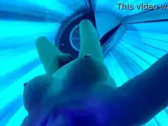 masturbating with nipple play in sunny studio sunbathing area