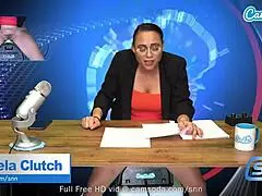 Hot MILF with huge boobs rides a sybian while reading news live on air.