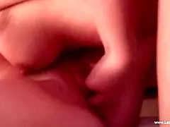 Blonde and brunette lesbians gently feel pussy.