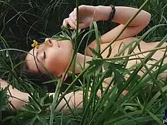 natural milf beauty enjoys nature and flowers outdoors