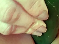 I was hot, opend my legs and masturbated with cucumber