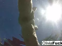 i'm olivia, having fun in the pool with my big tits out