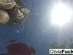 i'm olivia, having fun in the pool with my big tits out