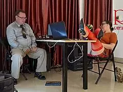 Monday in the office, an employee teases without panties during a naughty lick session.