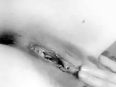 this busty milf is caressing her big tits at home