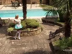 kinky girl watching her friend with two guys outdoor