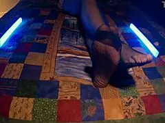 sensual soles perfect feet peek through fishnet pantyhose