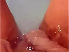 Wow, that pretty woman masturbates in the hot tub with a loud cumshot