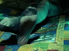 Perfect toes peek through sexy fishnets on a milf housewife