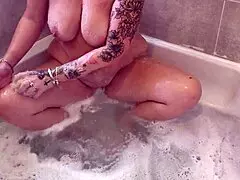 damn, watch this amateur milf soaping up her body for us right now!