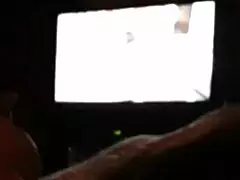 Cute milf fingering her hot pussy while watching porn