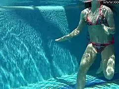 Check out Nicole, the skinny Russian milf with perfect ass and pointy nipples in bikini, smoking seductively.