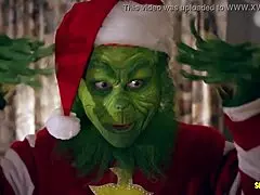 In this grinch parody, blonde milf with big tits gets monster cock in group scene