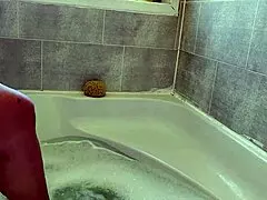 amateur wife enjoying a relaxing bath at home.