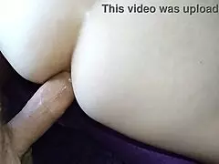 fuck in the ass while spreading her pussy wide. milf takes it deep with raw intensity.