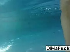 olivia splashes around in the pool with a big smile 😊