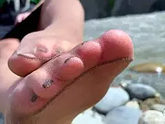 look at my cute nylon soles and toes by the riverside