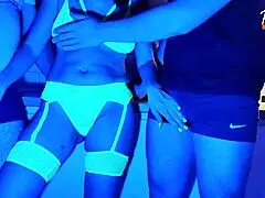 wife takes on two cocks in wild neon light threesome scene