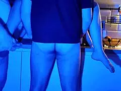 wife takes on two cocks in wild neon light threesome scene