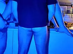 wife takes on two cocks in wild neon light threesome scene