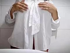 Pretty office girl relaxes in the bathroom with close-up views