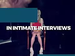 big busty woman covers her mouth at the gloryhole