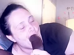 She says, 'Watch me give a no-teeth gumjob on this big black cock, deepthroating until he gags and cums on my face by accident'