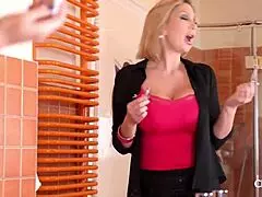 This milf just lured a guy into the shower for some fun. Things got steamy real quick.