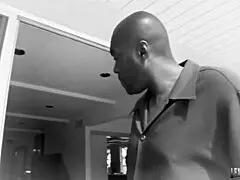 Sophie Dee, the redhead MILF with big tits, gets her pussy stretched by a huge cock in doggystyle.