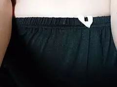 I watch this pregnant milf spitting on her big tits