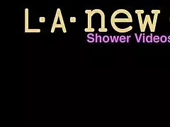 Brunette bombshell enjoys a relaxing shower on the sofa