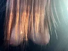 Italian milf Artemisia Love shows off big juicy tits. They bounce hot for the camera.