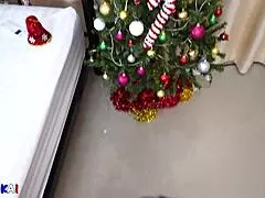 Asian wife sucks cock under the Christmas tree