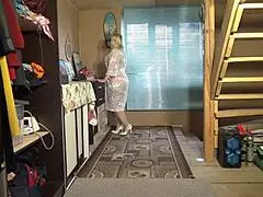 Juicy milf performs a seductive striptease in stunning lingerie and stockings.