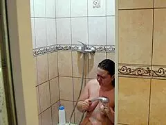 Chubby milf showers while home cam records