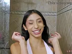 Girl next-door model strips down and takes a steamy shower on the sofa.