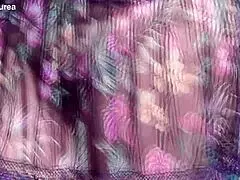 Hairy mature flashes assets in sheer outdoor dress.