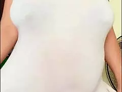 Pregnant Arab girl shows her big belly and milky boobs.