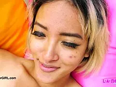 gorgeous asian model shows her sexy body during photoshoot