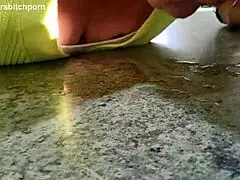 Kiwi milf sub cleans up wine spilled by her master in a fetish scene