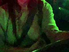 Is Artemisia Love flashing her big tits in the car