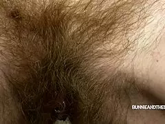 bunnieandthedude brushes a hairy ginger pussy in close up pov.