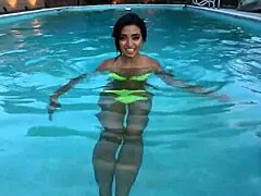 frida sante relaxes in lingerie by the pool