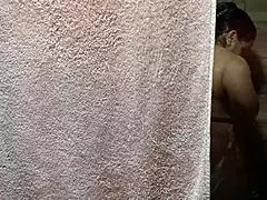 caught my aunt bathing at home, she masturbates and nearly spots me!