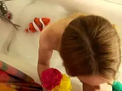 Beautiful MILF Sucks Cock in Bathroom