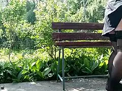 Sexy MILF pisses in park.
