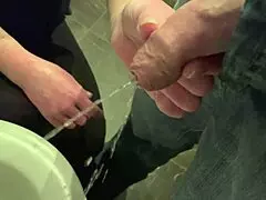 watch me hold his dick while he pees and wash my hands in it