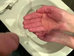watch me hold his dick while he pees and wash my hands in it