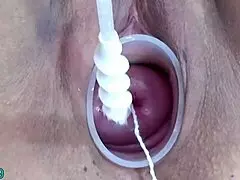 Intriguing extreme BDSM scene where Japanese MILF wife endures cervix prolapse with hanging bottles.
